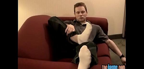 Young and handsome Tommy solo masturbates while showing his feet